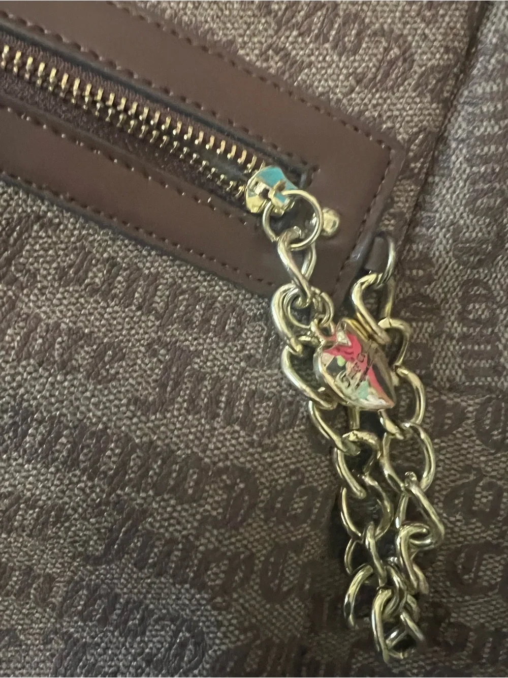 Juicy Couture Brown Monogram Backpack with Gold Chain Accent